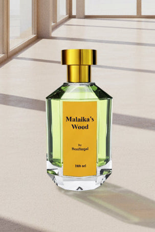 Malaika's Wood Extrait de Parfum bottle — oud, cedarwood and amber woody fragrance by RealRegal Perfumes USA